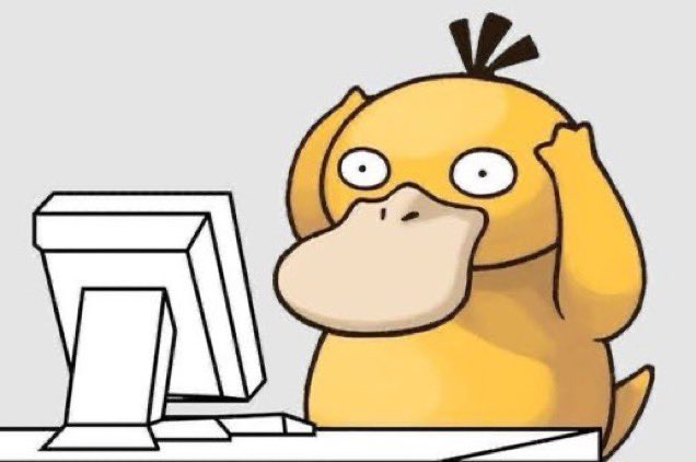 Psyduck confused sitting at computer — Reaction meme