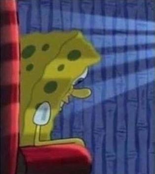 Spongebob sitting in chair dark room — Reaction meme