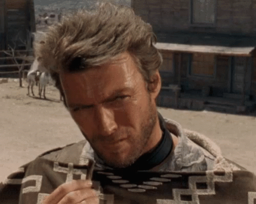 "The Man with No Name" Adjusting His Poncho — Reaction meme