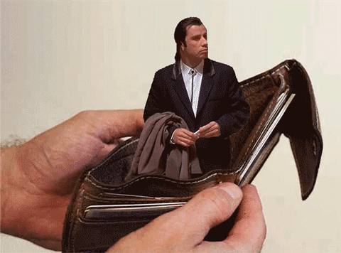 Tavolta looking around in wallet — Reaction meme