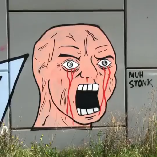 Pink wojak street art — Wojak meme